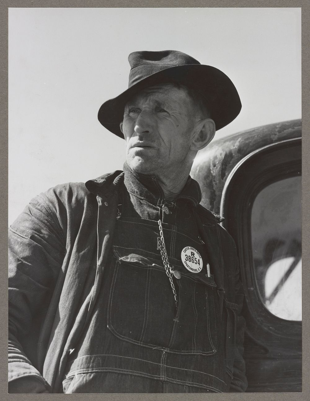 Farmer who had to move out of the Camp Croft area. He had a job at the camp. Whitestone, South Carolina. Sourced from the…