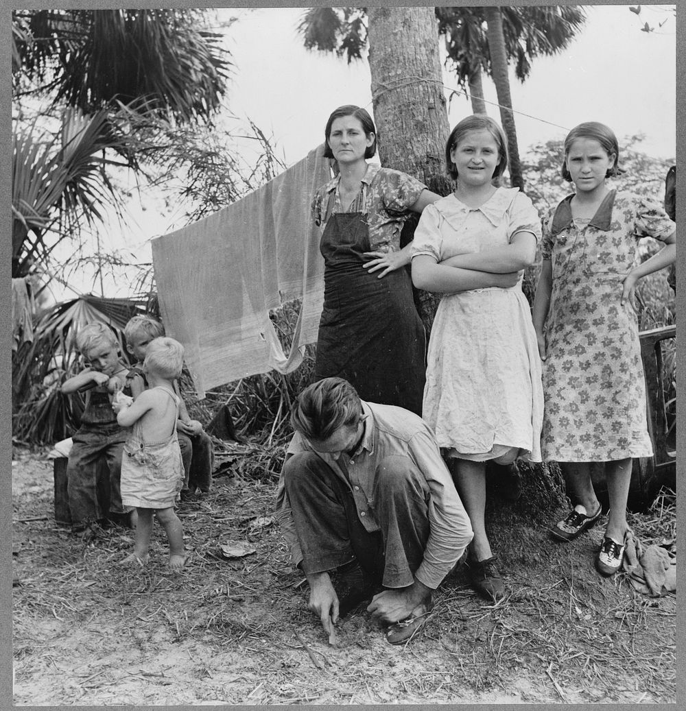 Migrant laborer's family, packing house workers. Canal Point, Florida. Sourced from the Library of Congress.