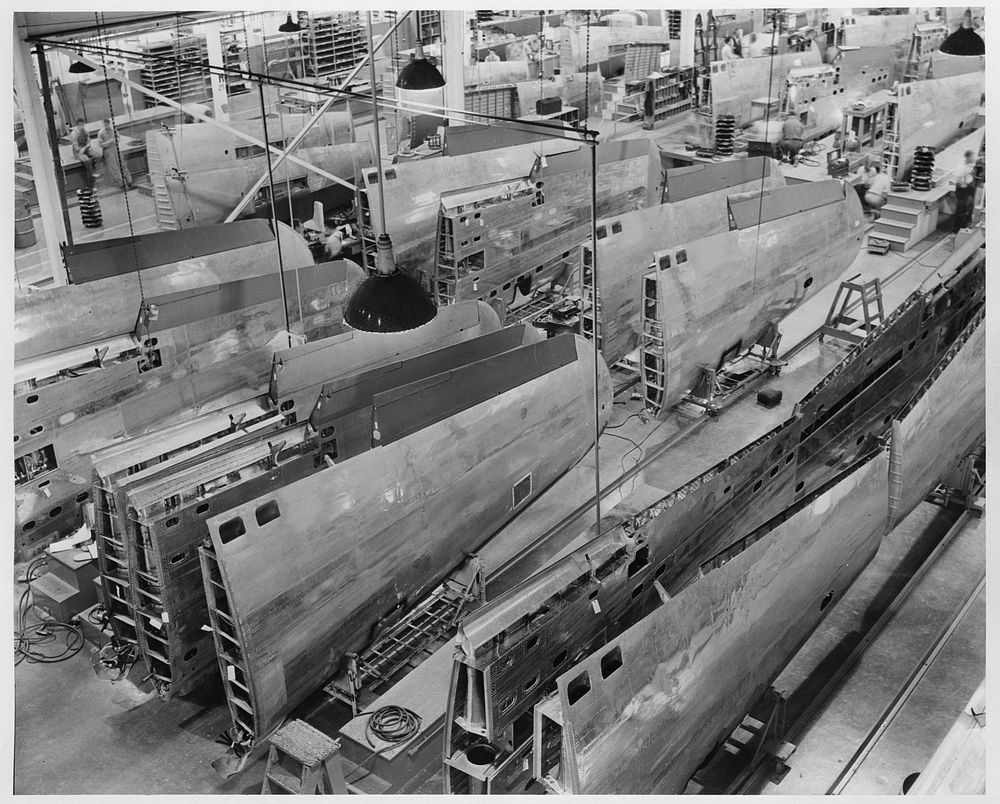 A partial view of North American Aviation's wing assembly department. Sourced from the Library of Congress.
