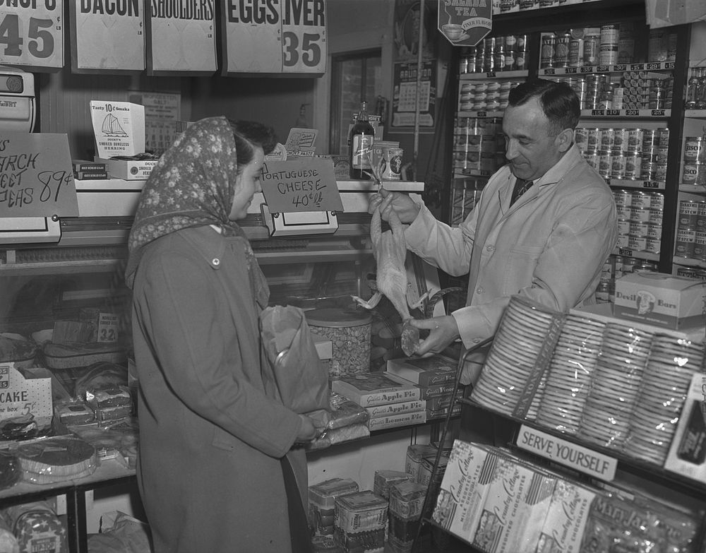 Provincetown, Massachusetts. Mrs. John Russe shopping in a Portuguese store. Sourced from the Library of Congress.