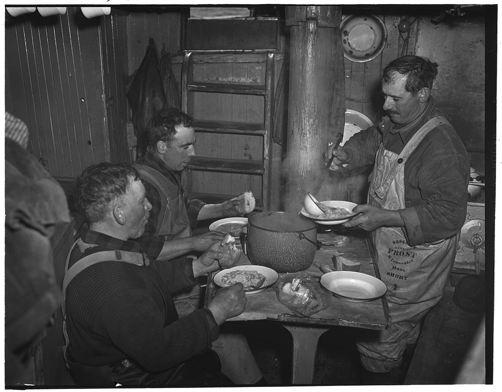 Provincetown, Massachusetts. Aboard the Frances and Marion, a Portuguese drag trawler, fishing off Cape Cod. Dinner aboard.…