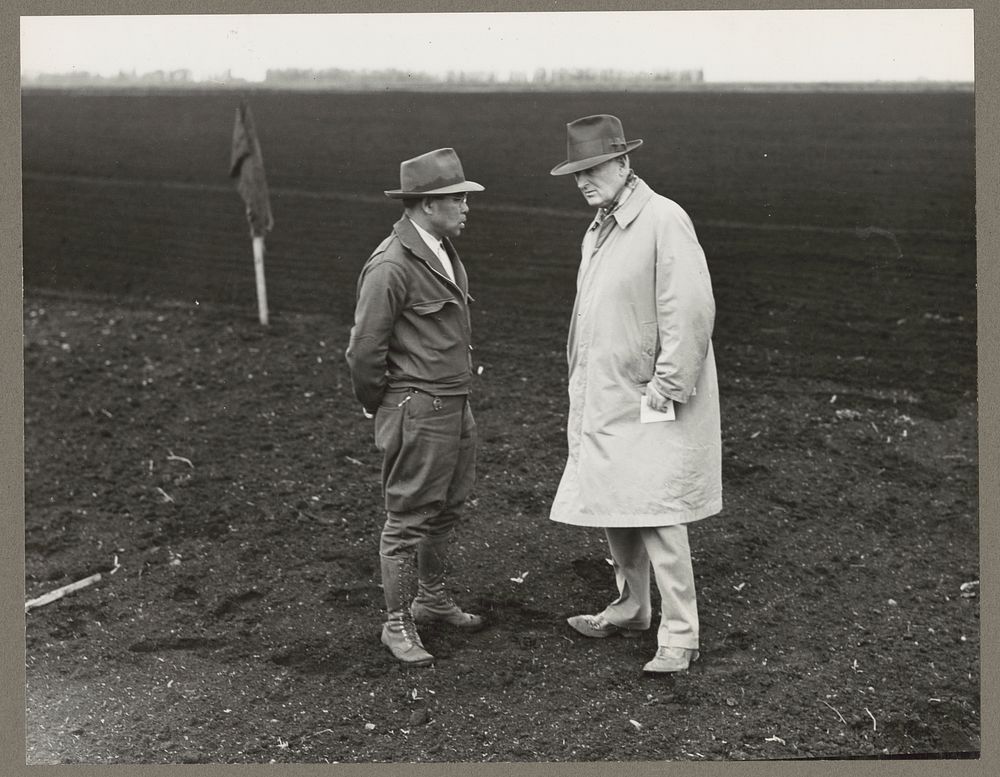 Stockton, Calif. Apr. 1942. Henry [i.e., Harry] T. Futamachi, left, superintendant of a 1300-acre mechanized ranch…