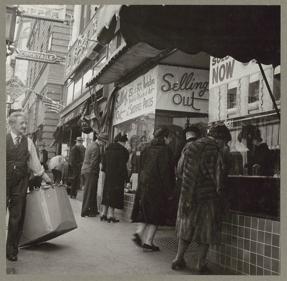 San Francisco, Calif. Apr. 1942. People in front of a store having a close-out sale, prior to the evacuation of the…