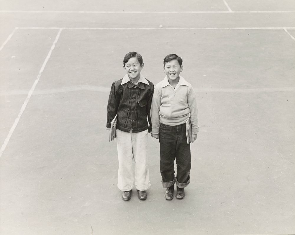San Francisco, Calif. Apr. 1942. Pals at Weill Public School - Yuichi Sumi, left, of Japanese ancestry, and Tommy Wong of…