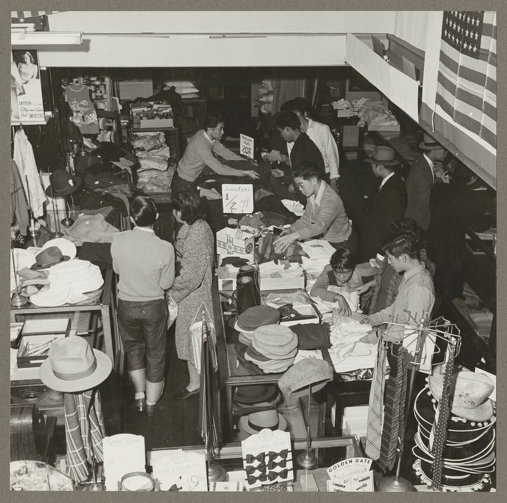 San Francisco, Calif. Apr. 1942. Customers buying merchandise in a store operated by a proprietor of Japanese ancestry…
