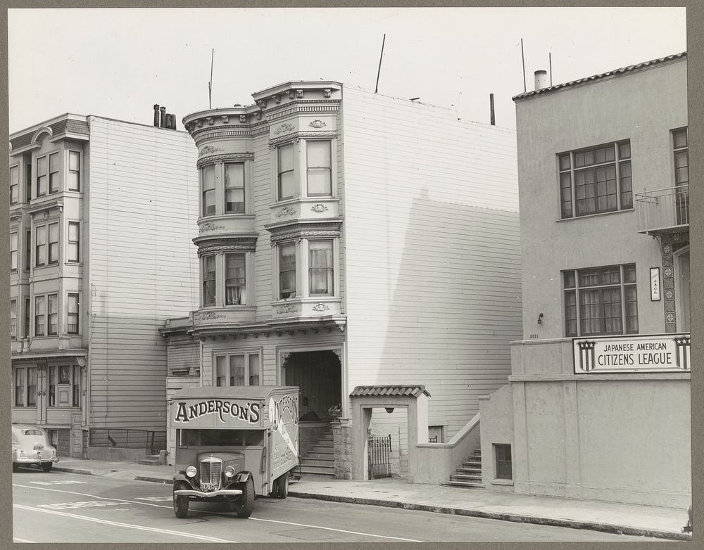 San Francisco, Calif. Apr. 1942. The moving van backing up to the curb to load possessions of evacuated residents of…