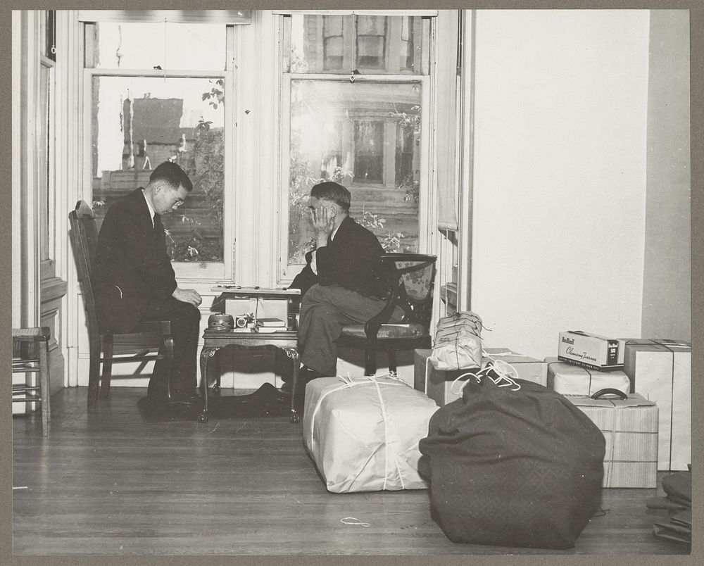 San Francisco, Calif. Apr. 1942. Two friends playing a final game while awaiting evacuation of persons of Japanese descent…