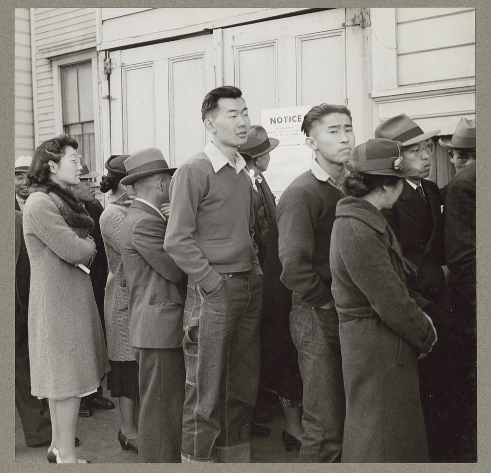 San Francisco, Calif. Apr. 1942. Residents of Japanese ancestry, in response to the US Army's Exclusion Order No. 20, being…