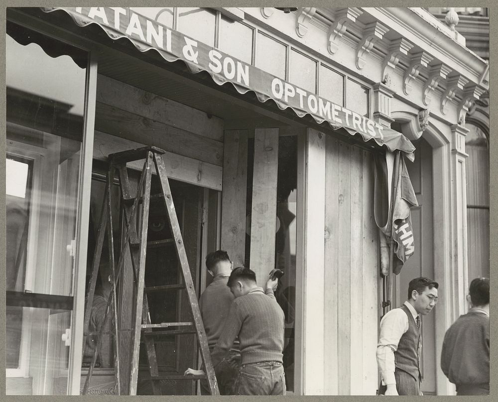 San Francisco, Calif. Apr. 1942. Owners boarding up windows of their stores on Post Street prior to their evacuation as…