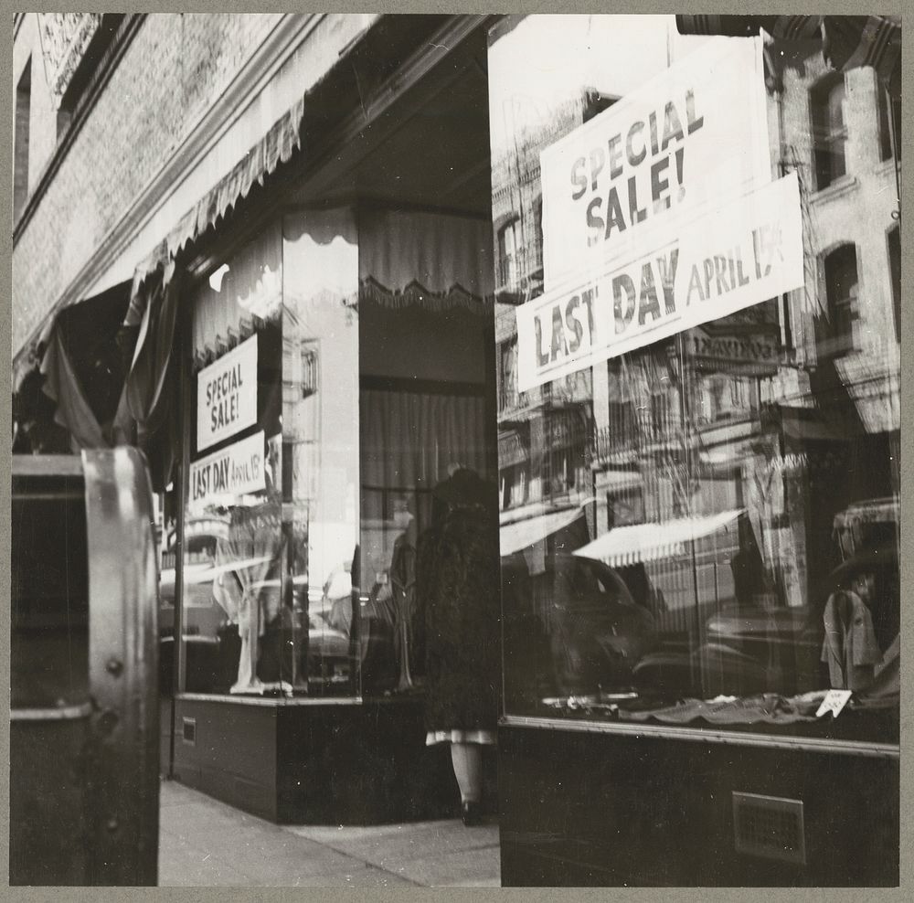 San Francisco, Calif. Apr. 1942. A closing-out sale advertised on the window of a store operated by a proprietor of Japanese…