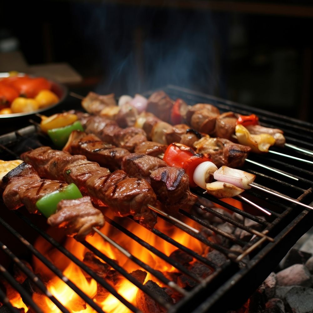 Barbecue grilling cooking meat. AI generated Image by rawpixel.