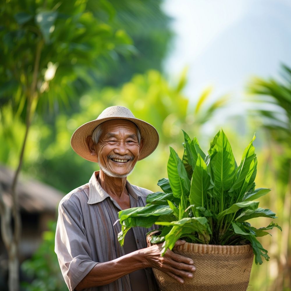 Plant gardening outdoors smiling.