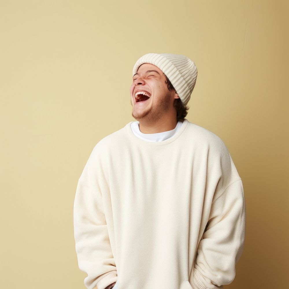 Laughing sweater studio shot relaxation. 