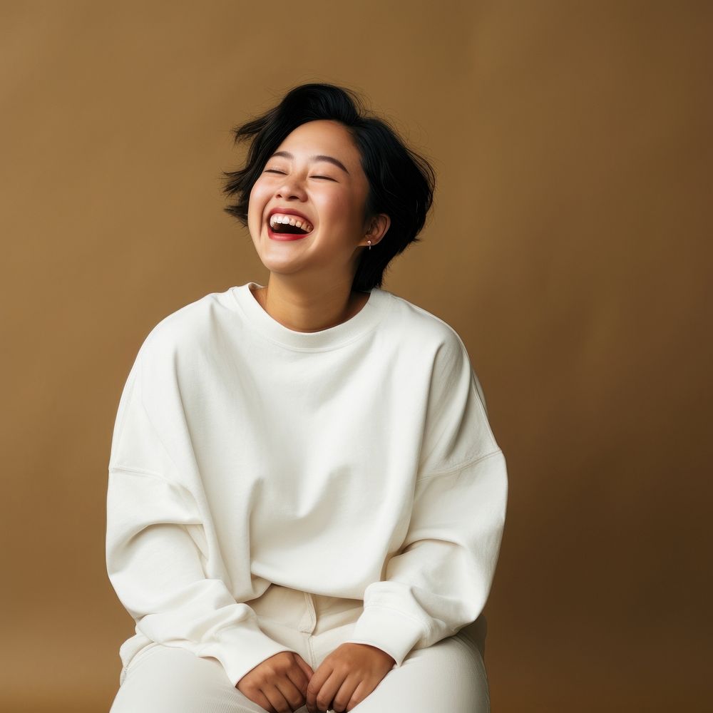 Laughing sweater looking adult. AI generated Image by rawpixel.