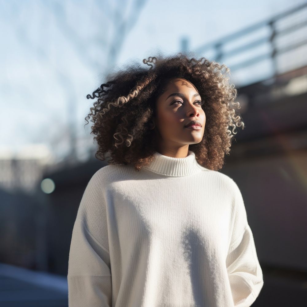 Sweater outdoors looking adult. 