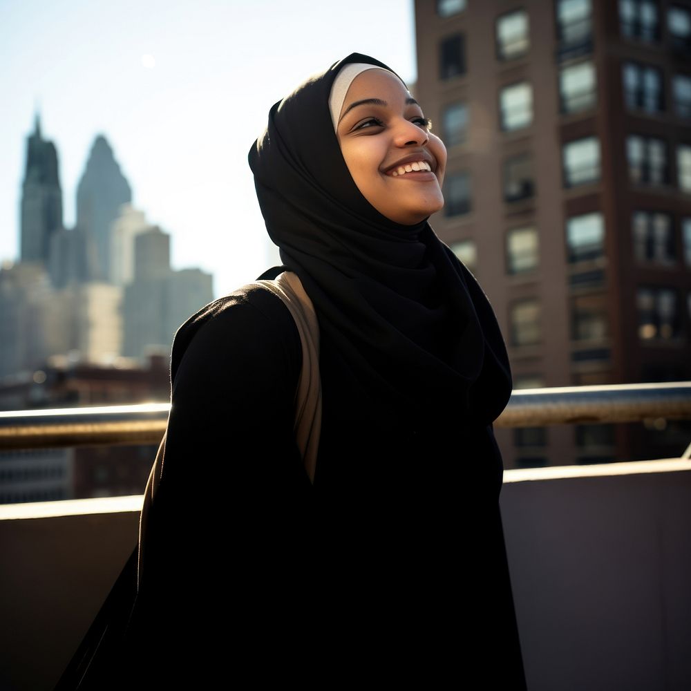 Muslim woman city portrait smiling. AI generated Image by rawpixel.