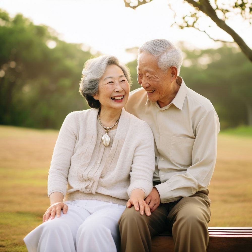 Asian senior couple laughing adult man. 