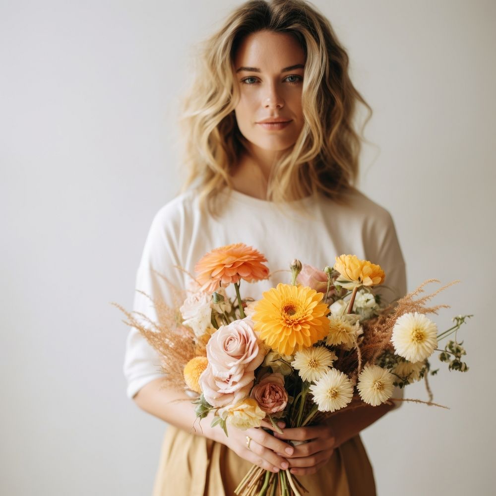 Florist holding beautiful bouquet portrait flower plant. 