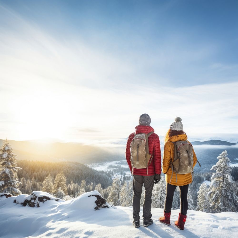 Rear of a Couple hikers with beautiful winter scene. AI generated Image by rawpixel. 