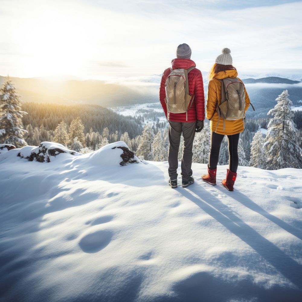 Rear of a Couple hikers with beautiful winter scene. AI generated Image by rawpixel. 