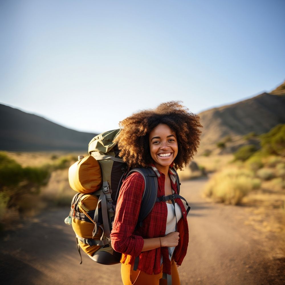 A Africa woman adventure backpack outdoors. AI generated Image by rawpixel.