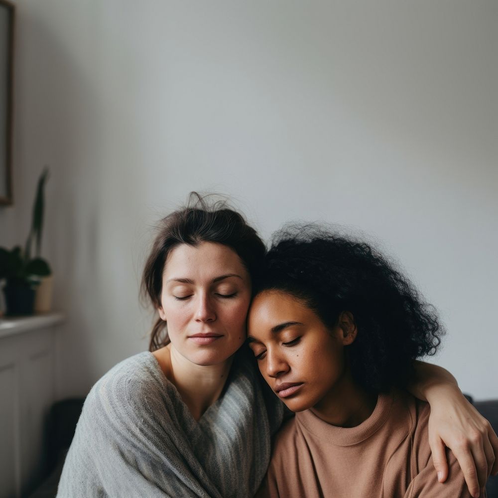 2 women hugging portrait adult photo. 