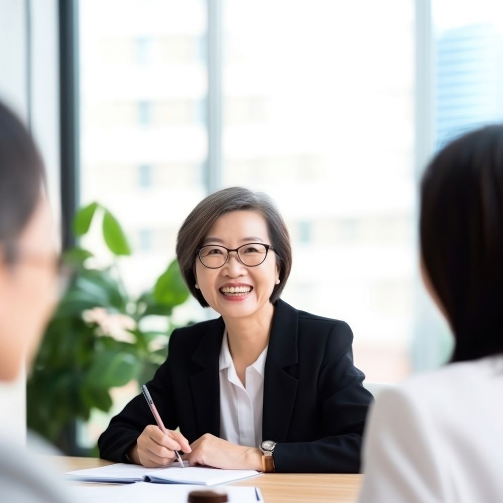 Asian senior female conversation interview contract. AI generated Image by rawpixel.