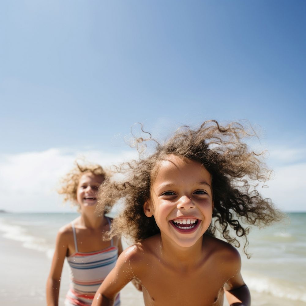 Beach child laughing portrait. AI generated Image by rawpixel.