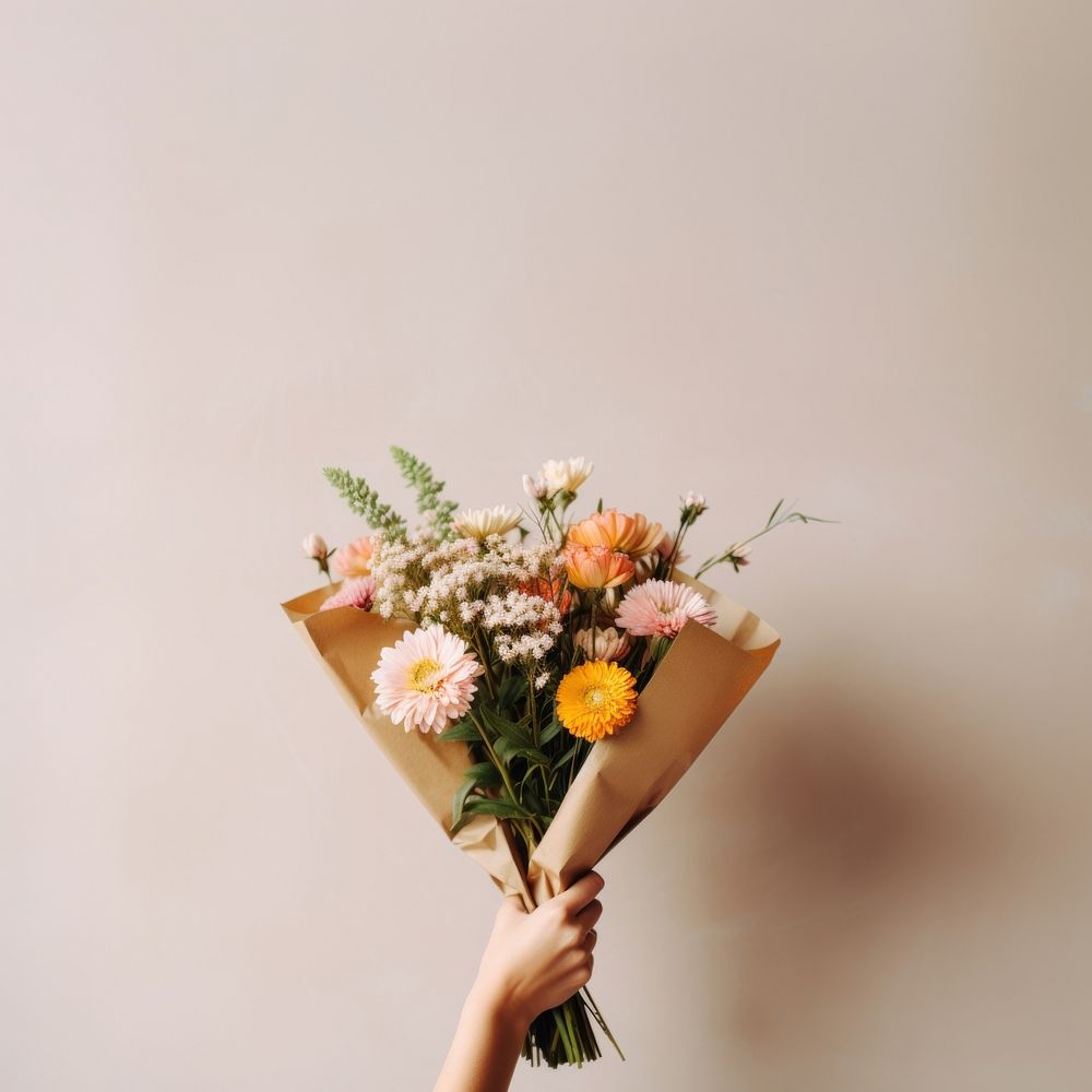 Hands holding flower bouquet plant inflorescence celebration. 