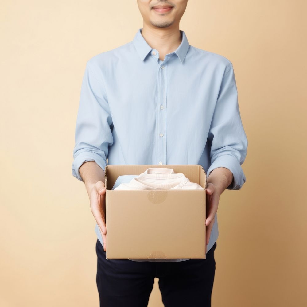 Man holding box cardboard celebration delivering. 