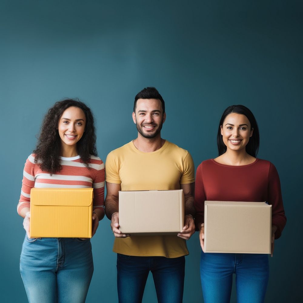 Volunteers holding donation box cardboard adult. 