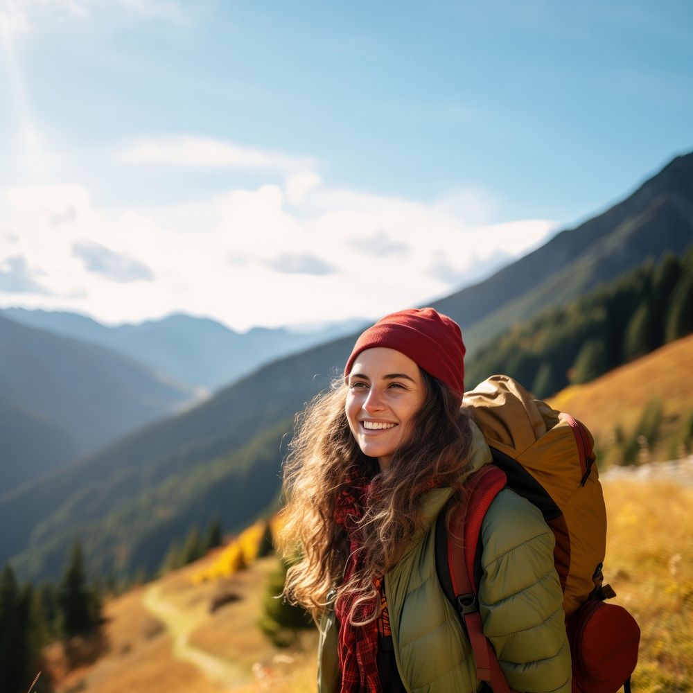 Photo of happy smiling woman hiking in mountains. AI generated Image by rawpixel. 