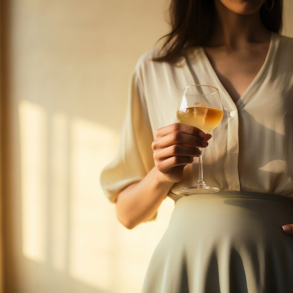 Woman hand holding cocktail drinking glass adult. AI generated Image by rawpixel.