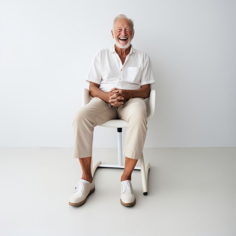 Grandpa footwear sitting smiling. 