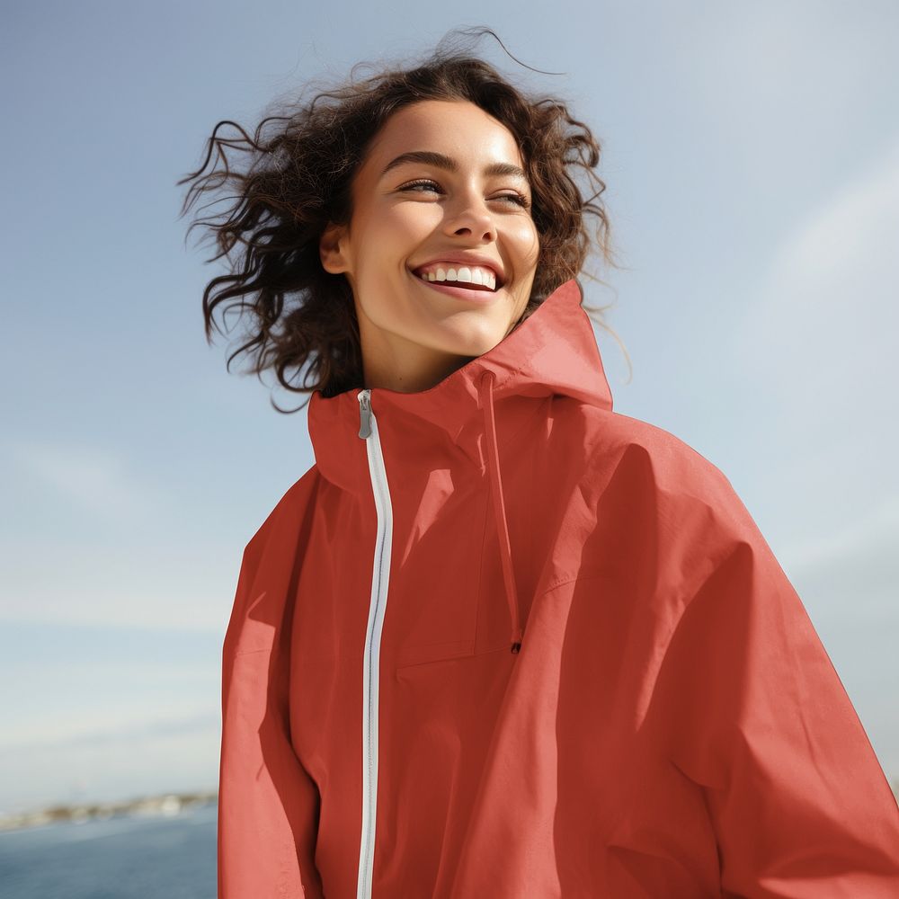 Woman wearing red windbreaker jacket, sportswear