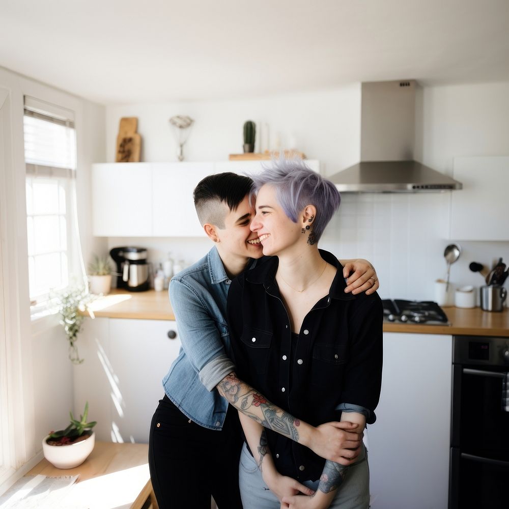 Smiling lesbian couple portrait kissing kitchen. AI generated Image by rawpixel.