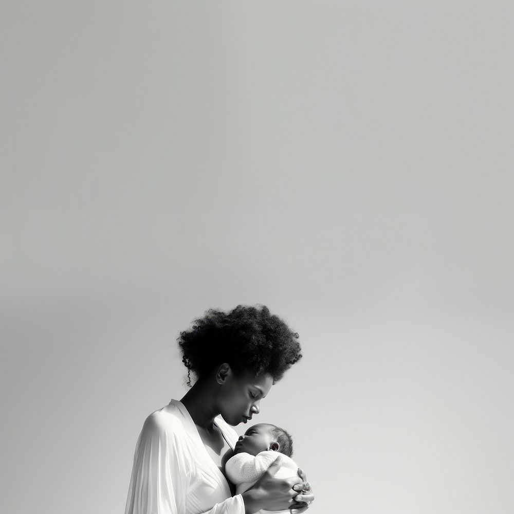 close up photo of a black mother holding her Baby. AI generated Image by rawpixel. 