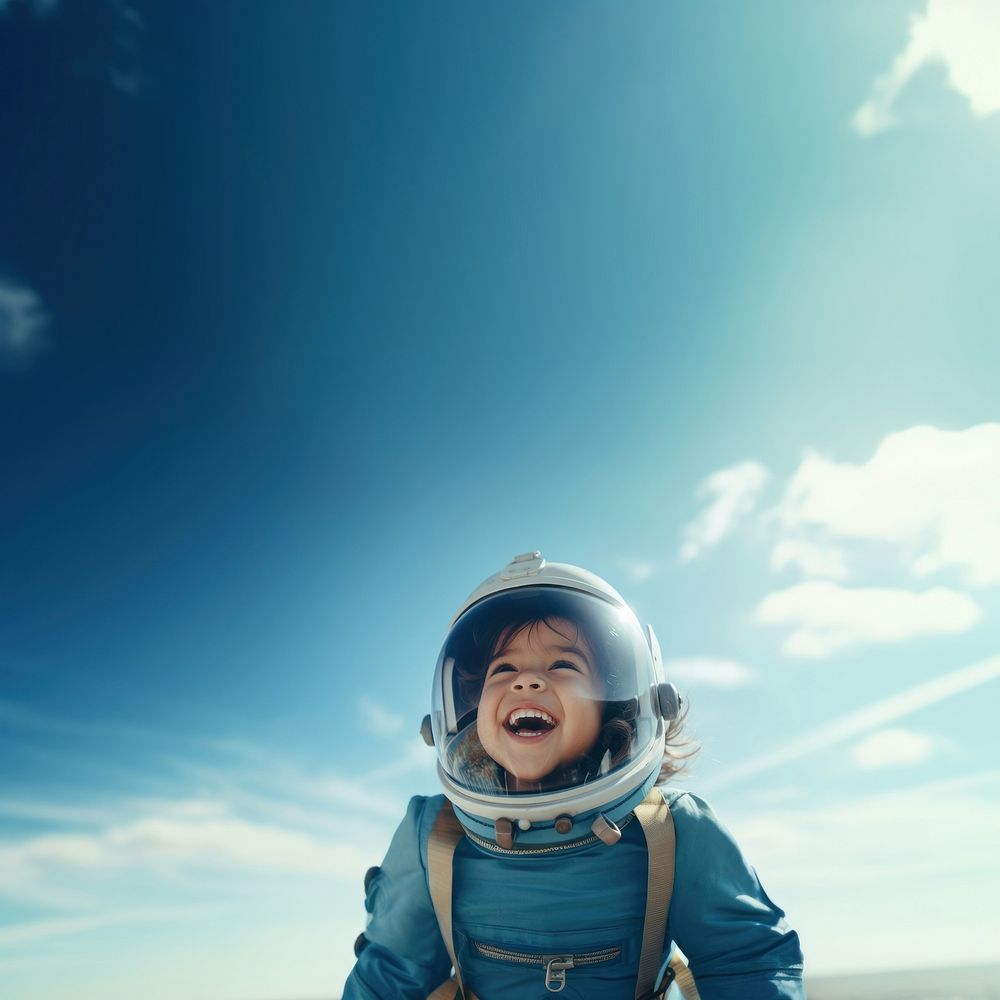 photo of smiling girl child dressed as astronaut.  