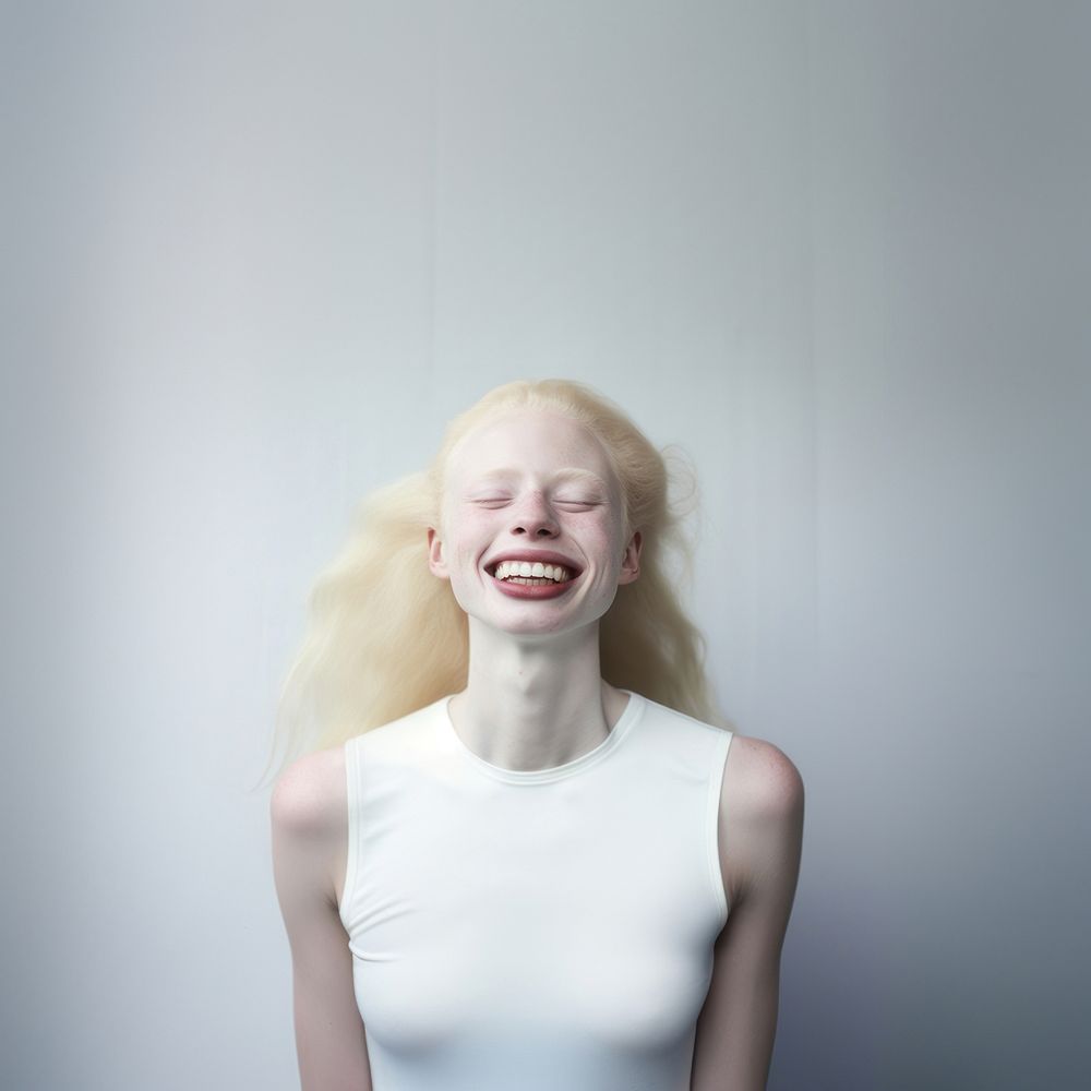 Albinism woman laughing portrait adult. AI generated Image by rawpixel.