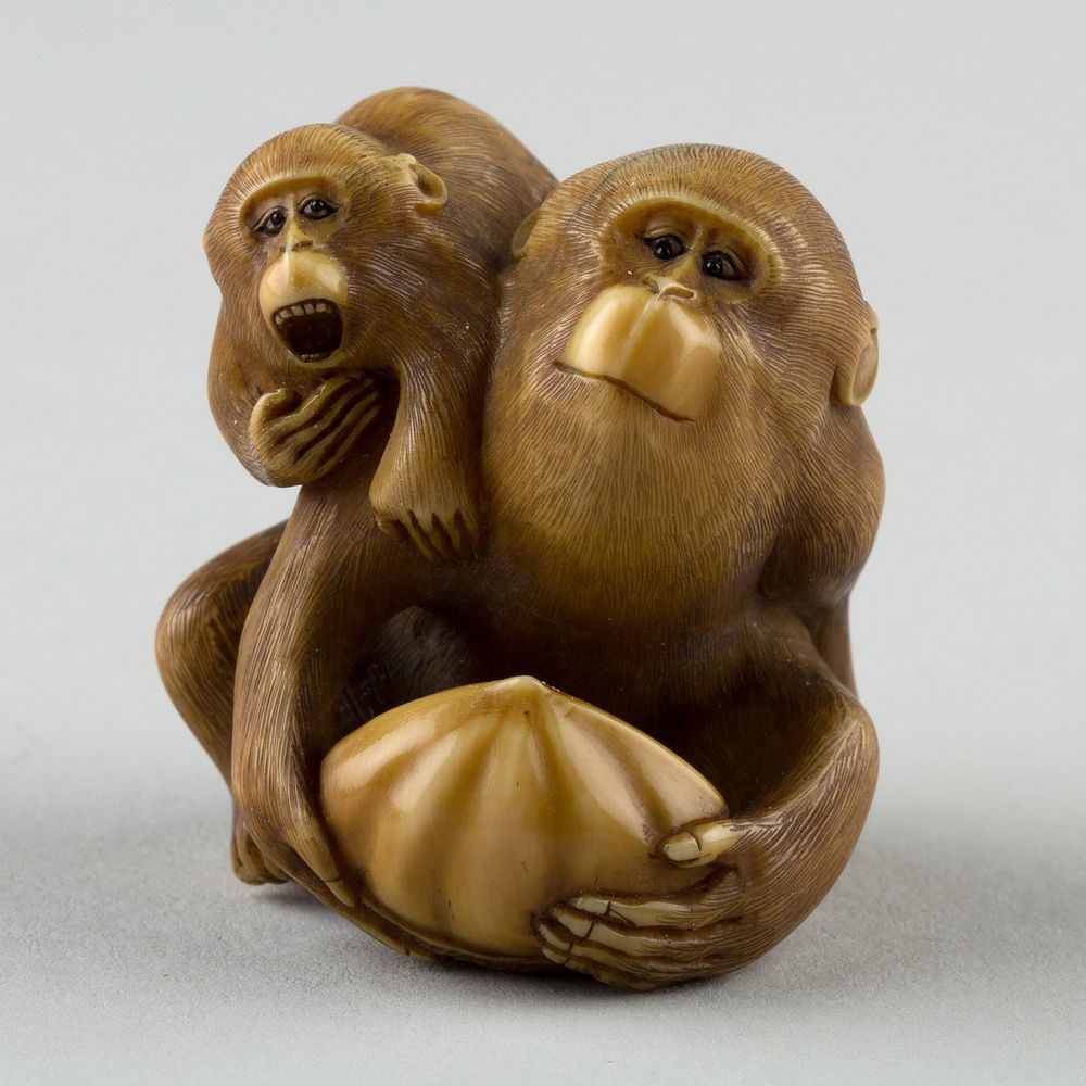 Netsuke Female Monkey Holding Nut | Free Photo - rawpixel