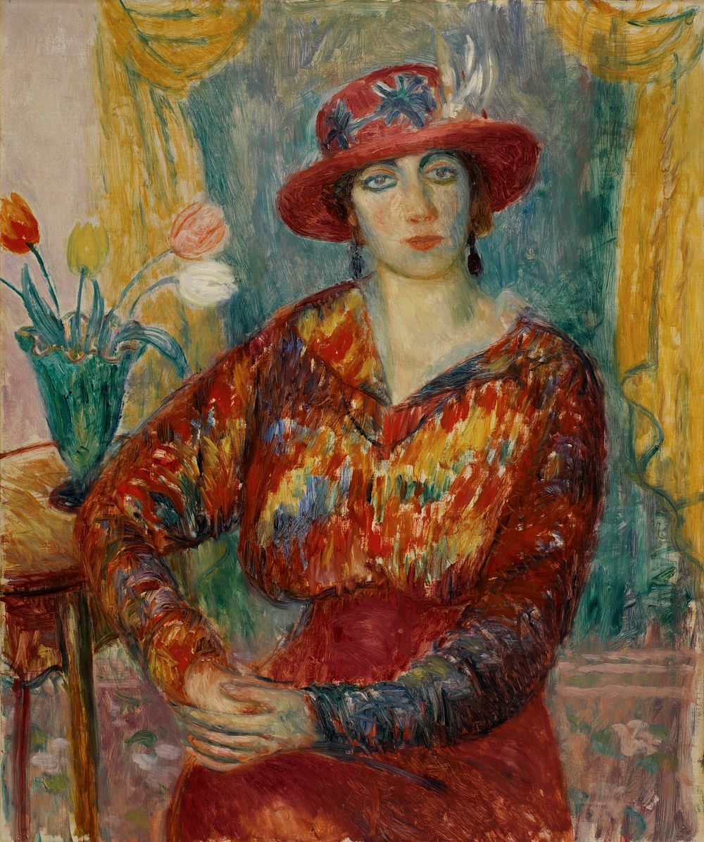 Woman in Red Blouse with Tulips by William James Glackens
