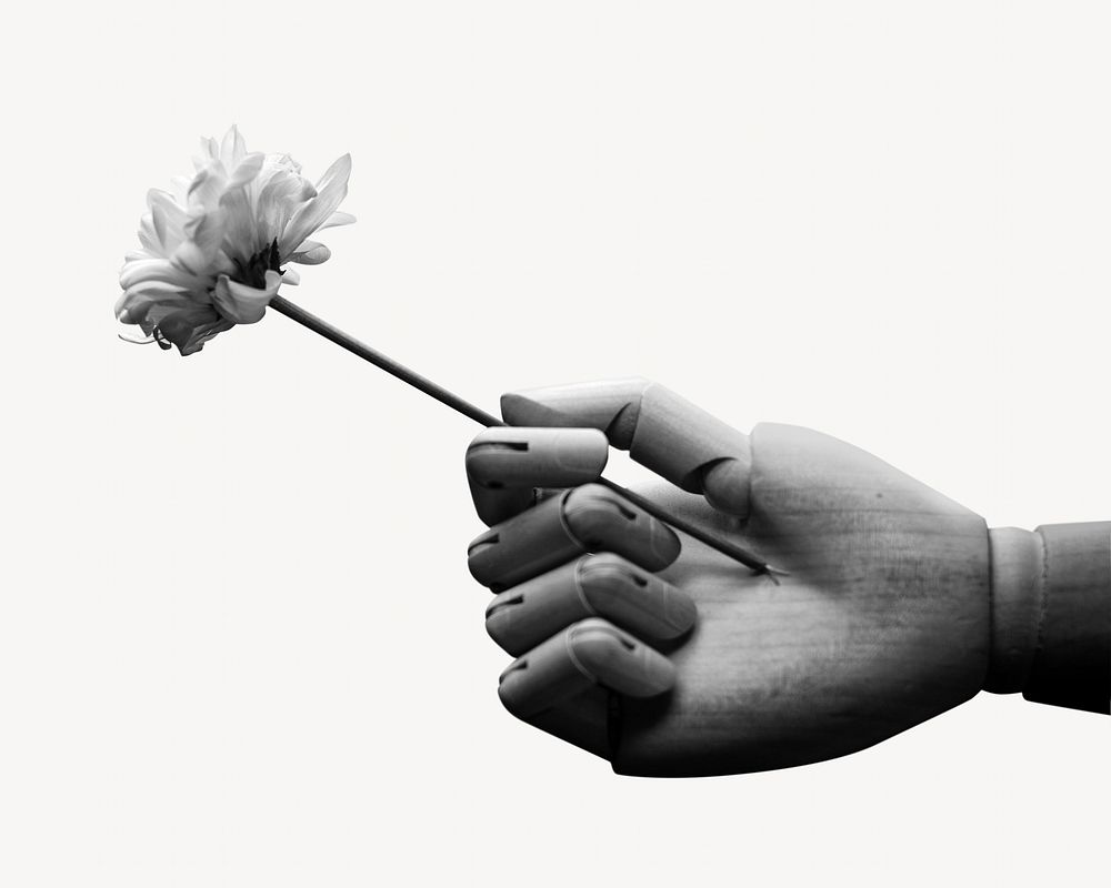 Mannequin hand holding flower, isolated image