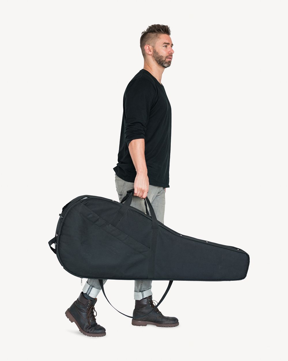 Man carrying guitar case, isolated image
