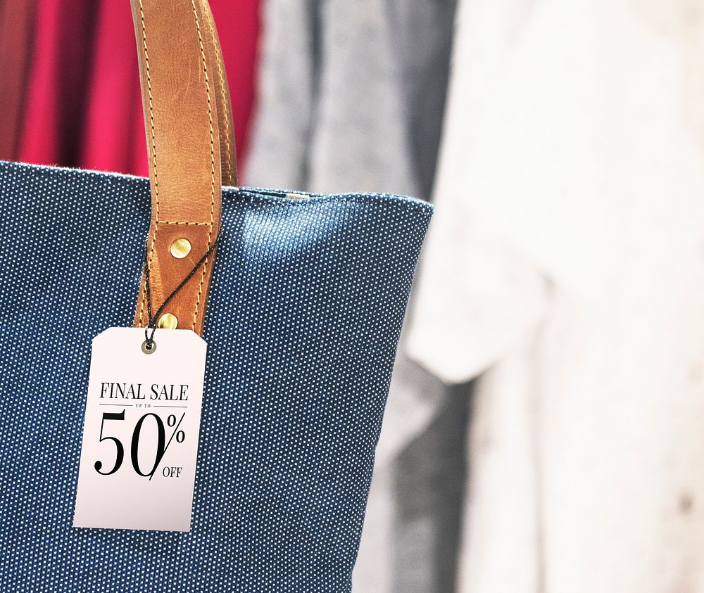 Close up of a 50% sale tag on a bag