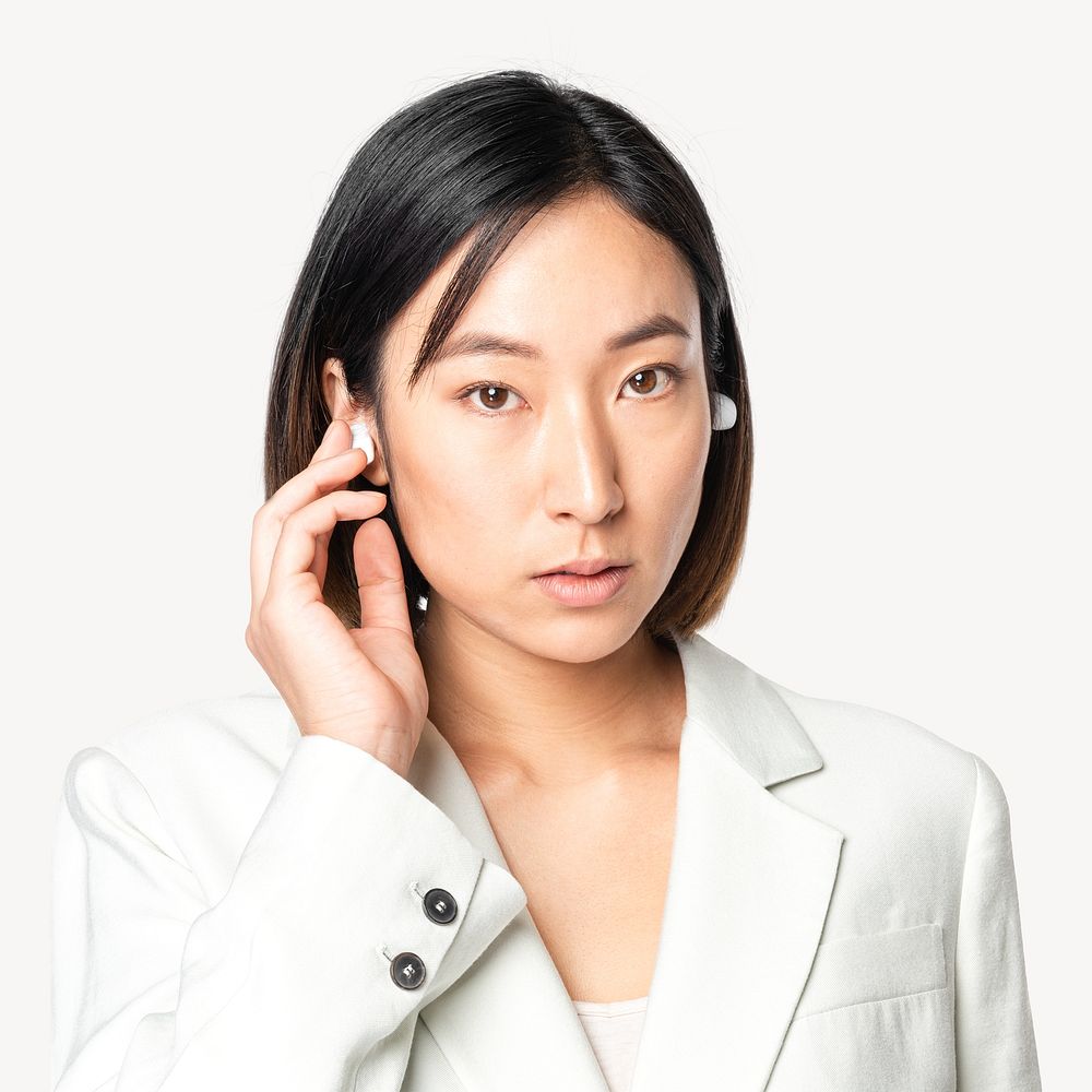 Businesswoman with wireless earbuds isolated image