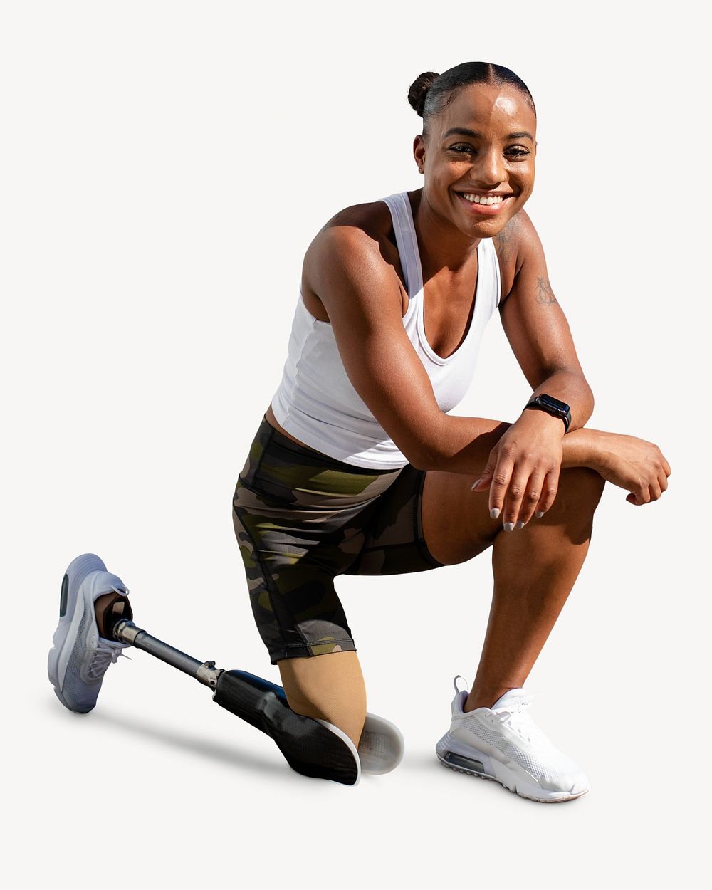 Smiling athlete with prosthetic leg kneeling down on the floor isolated design