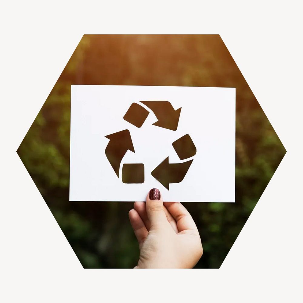 Hand holding recycle sign hexagonal shaped badge