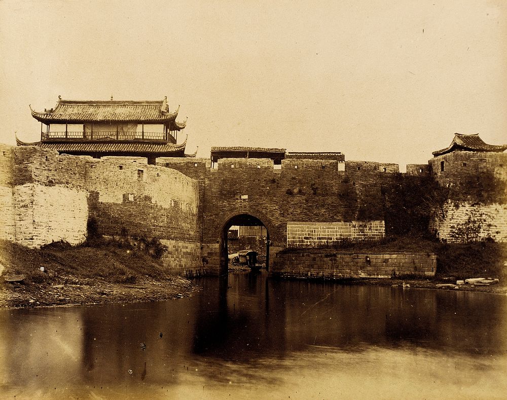 Walled River and Bridge with Buildings Above by Felice A Beato