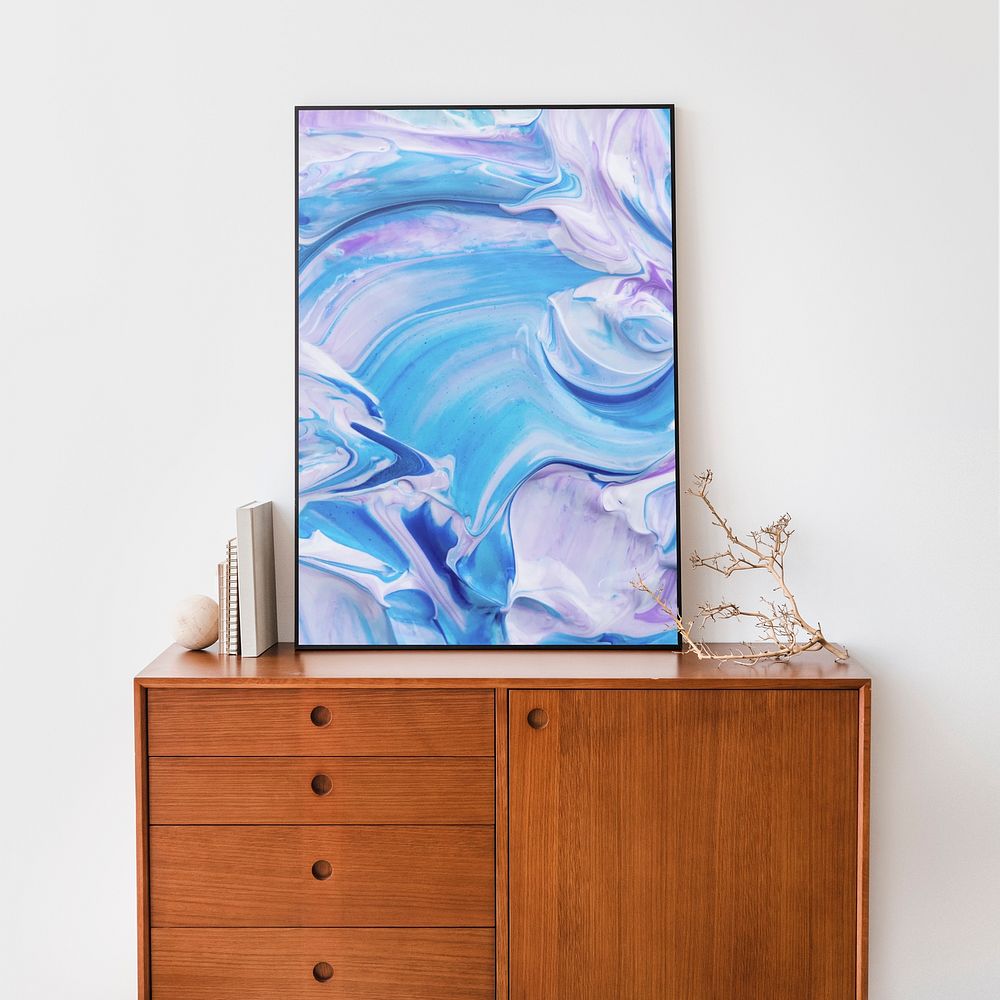 Fluid art frame on wooden cabinet