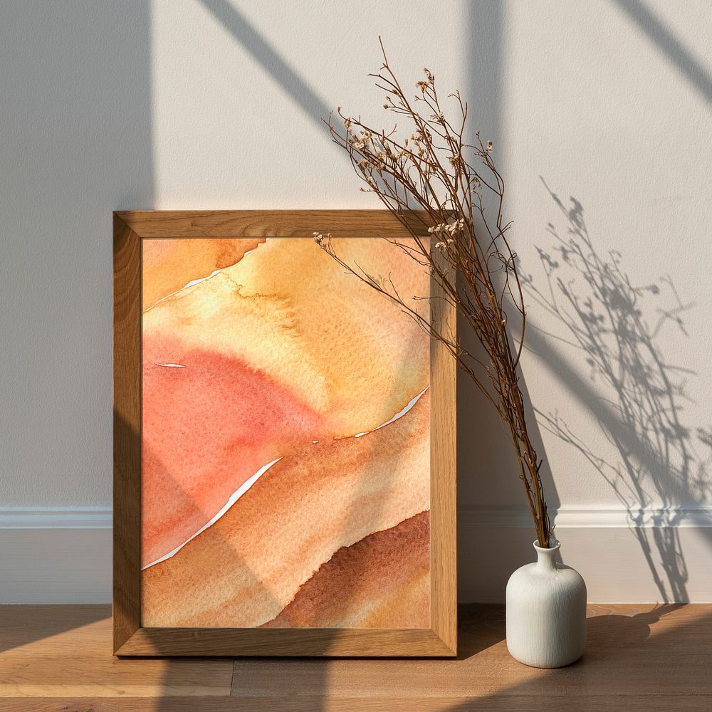 Watercolor artwork in a wooden frame mockup on the floor